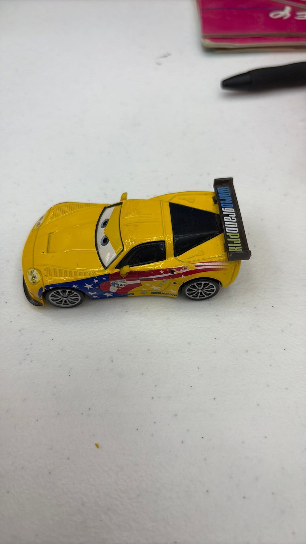 12B- Disney Pixar Cars 2 World Grand Prix Jeff Gorvette 1:55 Diecast Metal Race Car - see photos