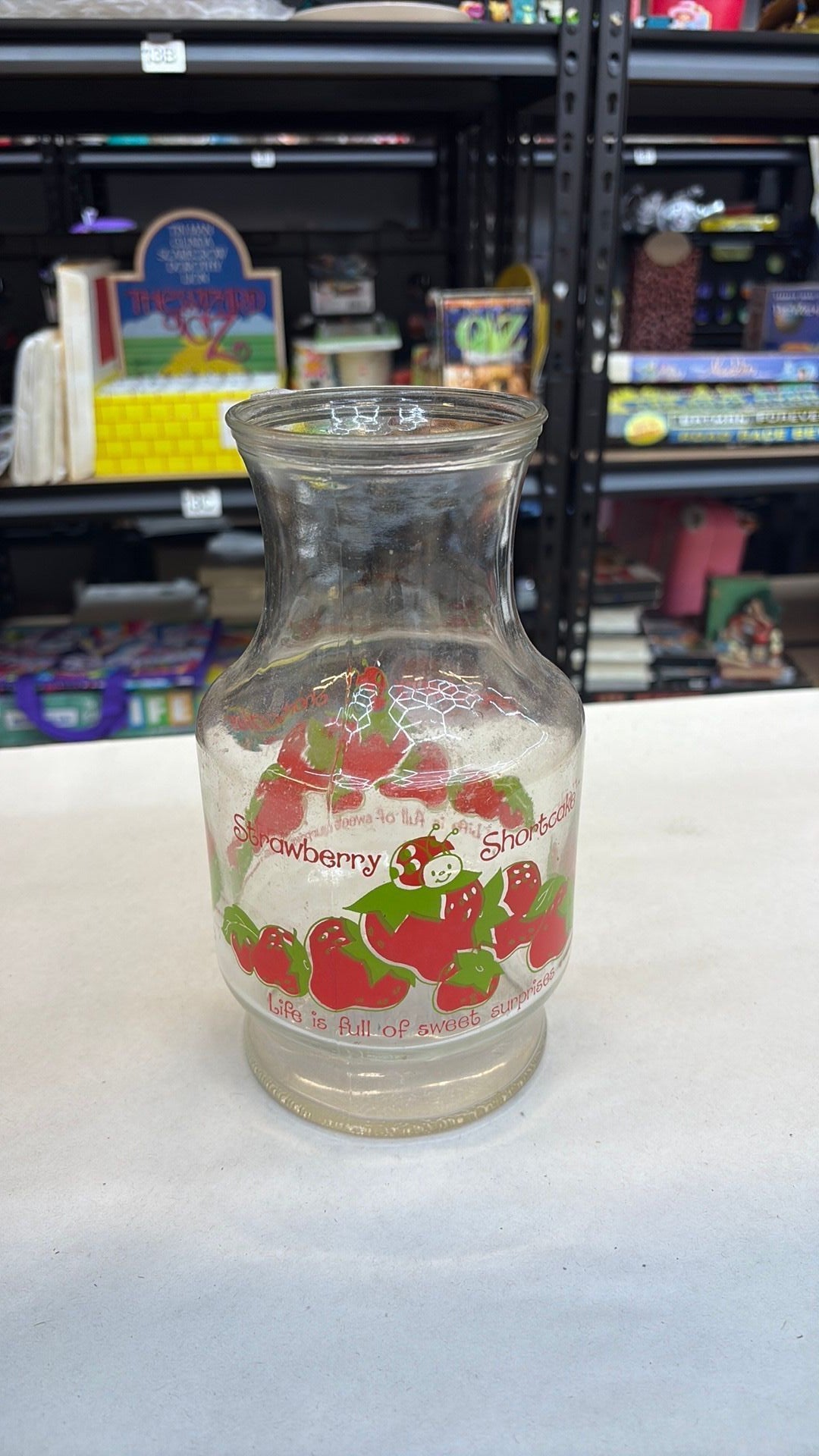 11B- Vintage Anchor Hocking Glass 1980 Strawberry Shortcake 52 oz. Carafe - needs cleaned