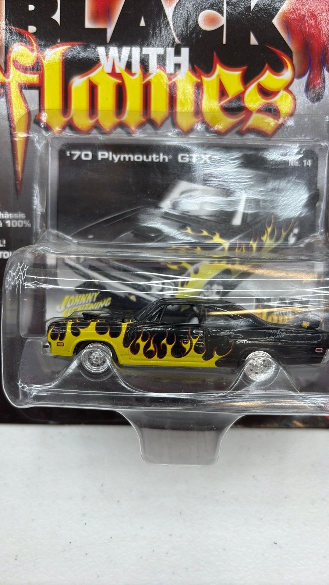 Johnny Lightning – ’70 Plymouth® GTX™ - Street Freaks Black with Flames