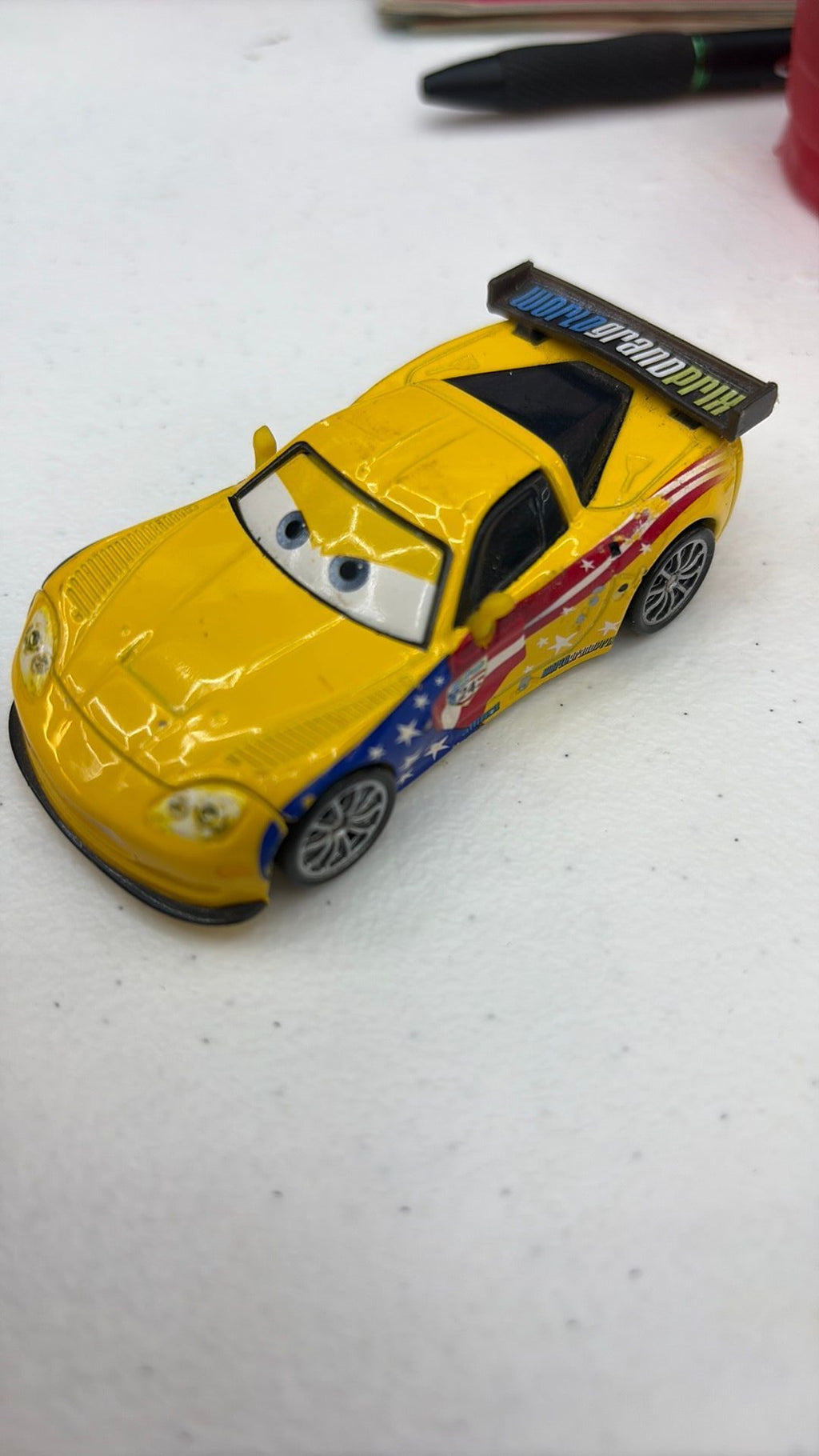 12B- Disney Pixar Cars 2 World Grand Prix Jeff Gorvette 1:55 Diecast Metal Race Car - see photos