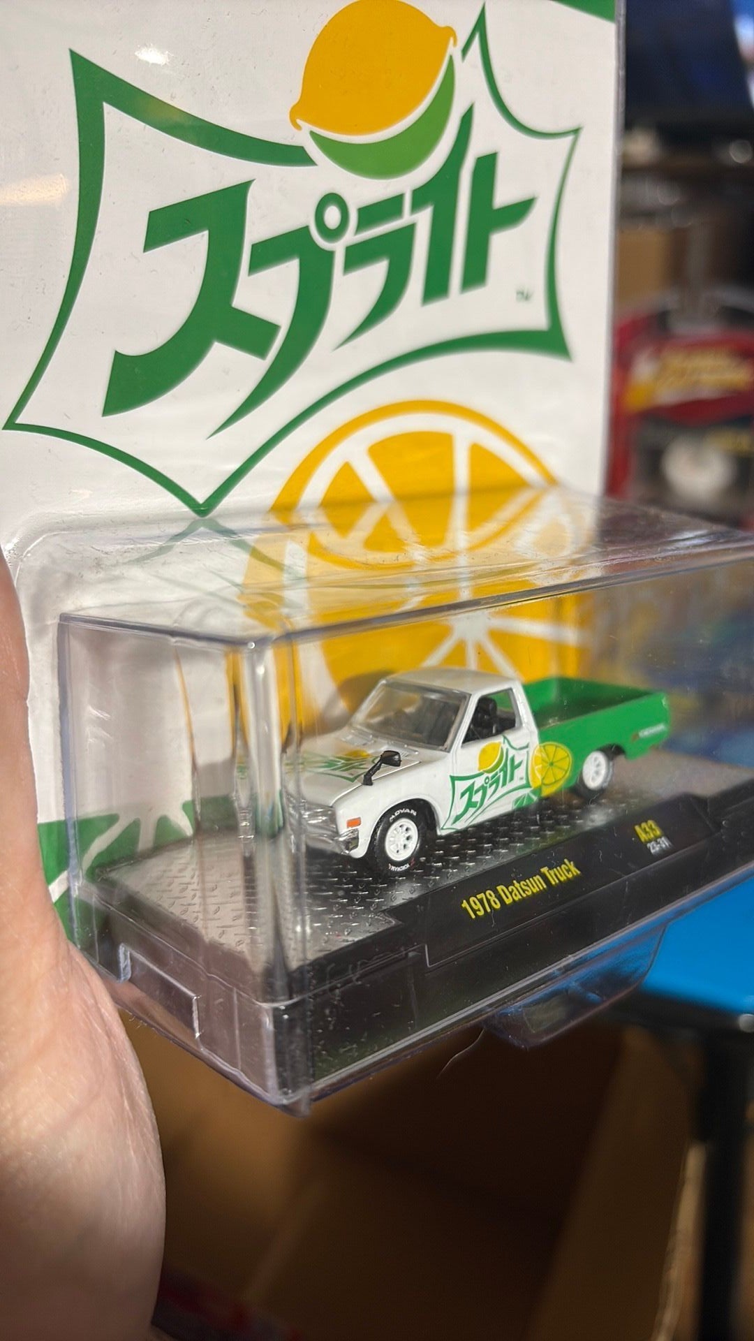 F. 2023 M2 Machines Coca Cola Japan's Sprite 1978 Datsun Truck