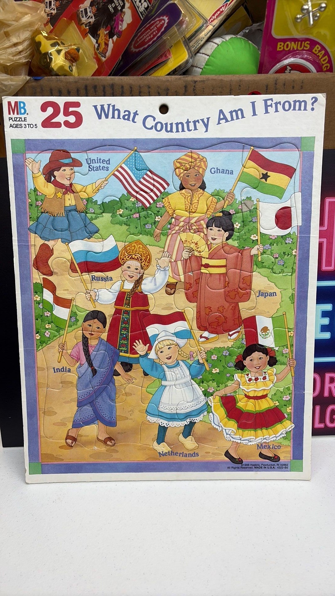 4B- 1998 Milton Bradley (MB) jigsaw puzzle titled "What Country Am I From?
