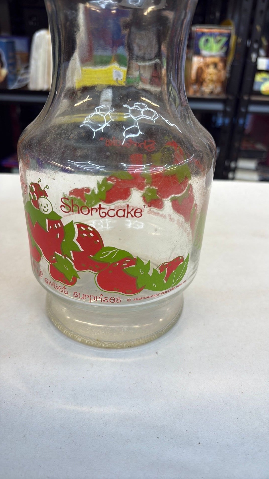 11B- Vintage Anchor Hocking Glass 1980 Strawberry Shortcake 52 oz. Carafe - needs cleaned