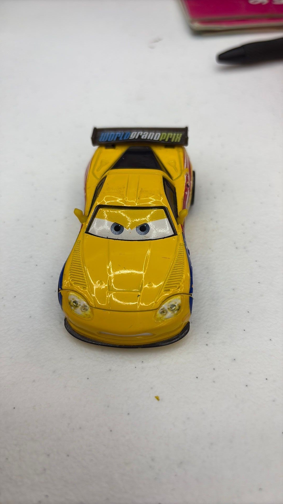 12B- Disney Pixar Cars 2 World Grand Prix Jeff Gorvette 1:55 Diecast Metal Race Car - see photos