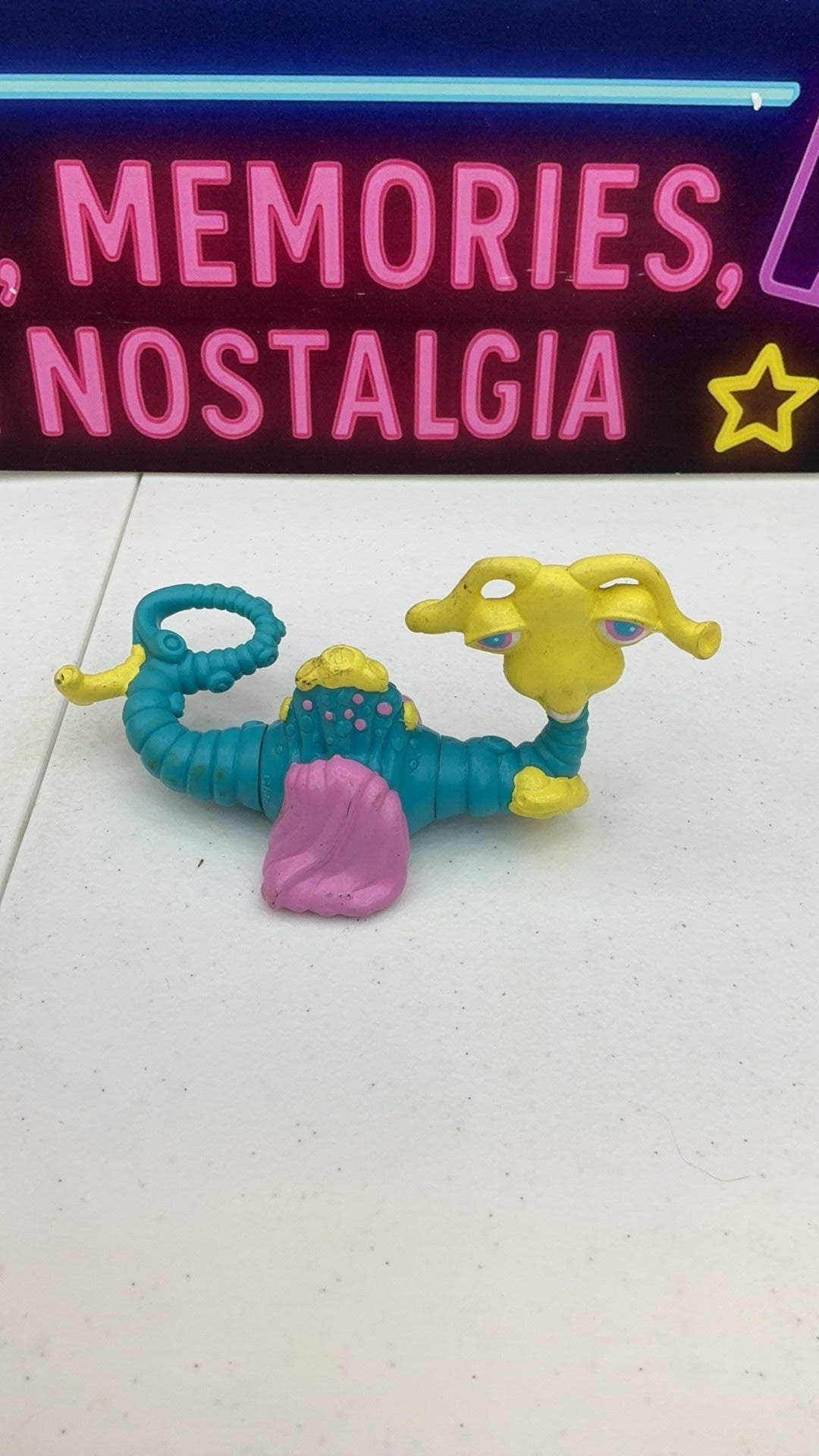 11B- Vintage Current Inc. Blue/Yellow/Pink Interchangeable Swamp Monster PVC Toy 80s